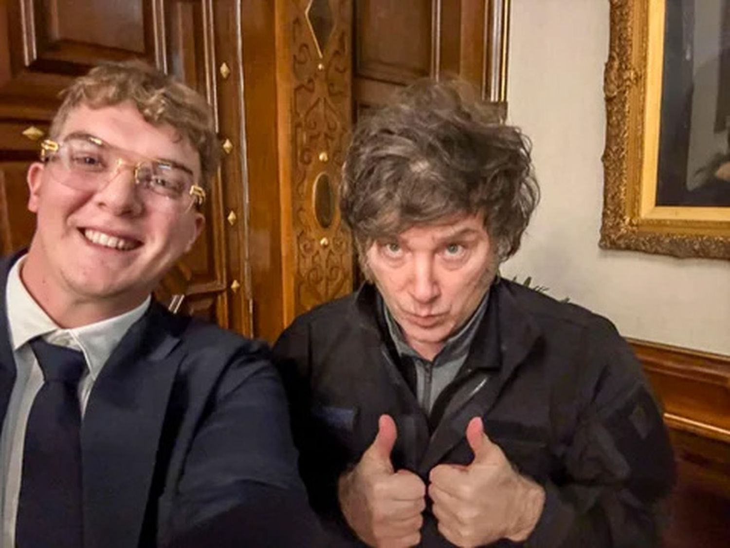El presidente Javier Milei, junto al creador de $LIBRA, Hayden Davis.