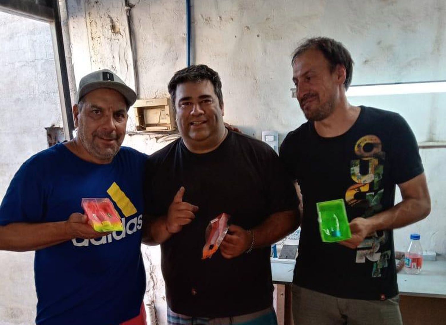 Podio. Lo componen el tandilense Pontaroli, Miguel Rudfolph (h) y Edgardo Coronel