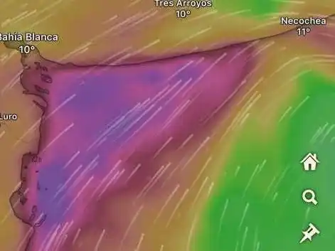La imagen de Windy anuncia para este domingo a las 11, la dirección de los fuertes vientos con flechas, y su intensidad en un tono púrpura