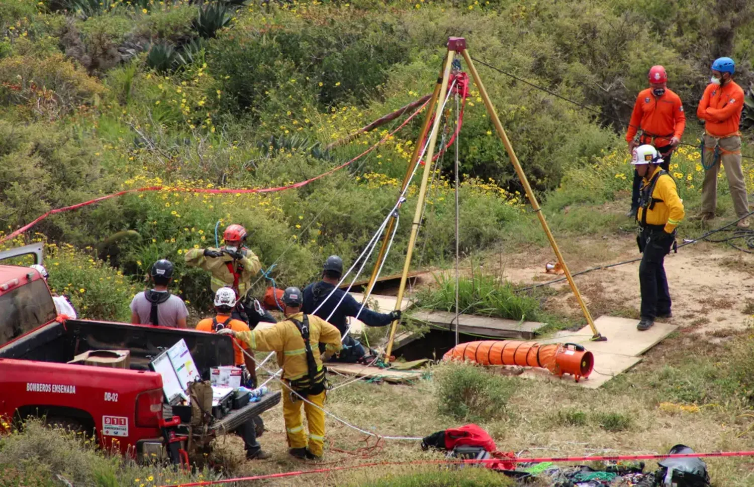 The bodies were found in a well last week.