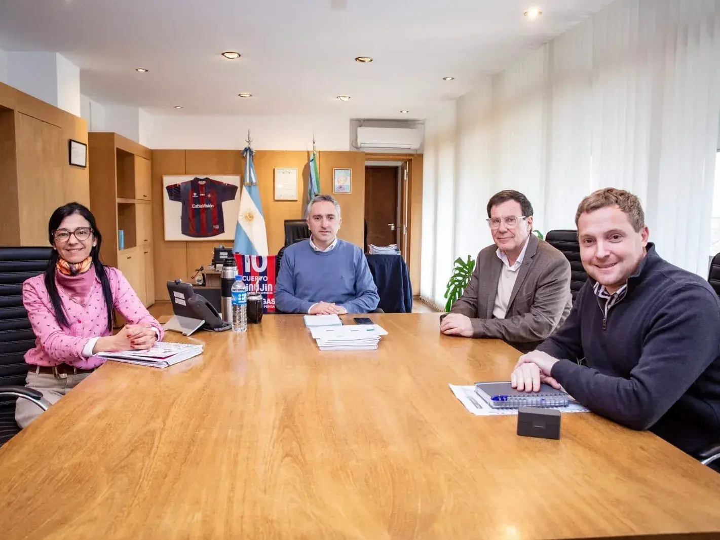 Juan Carlos Chalde y Luciano Ripoll junto al ministro Andrés Larroque