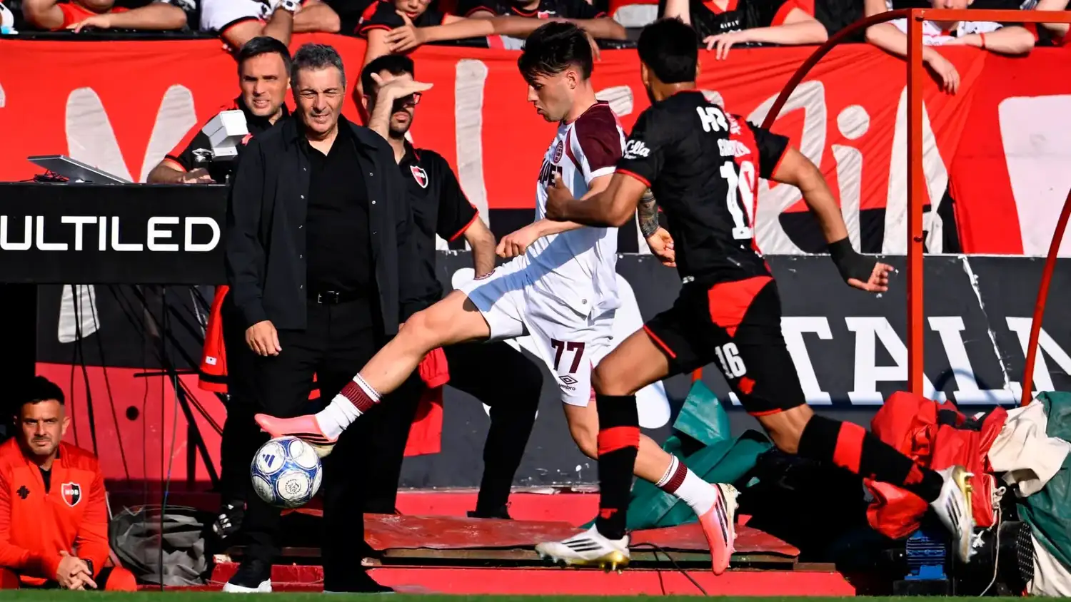 Besozzi y Carrizo, en el partido en Rosario.