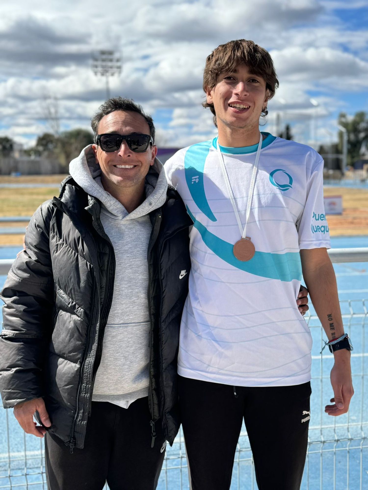 Santino Marchetti, junto a su entrenador Mauro Cabrera