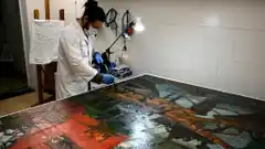 El laboratorio de conservación del Mumbat restauró una valiosa obra de Quinquela Martín 