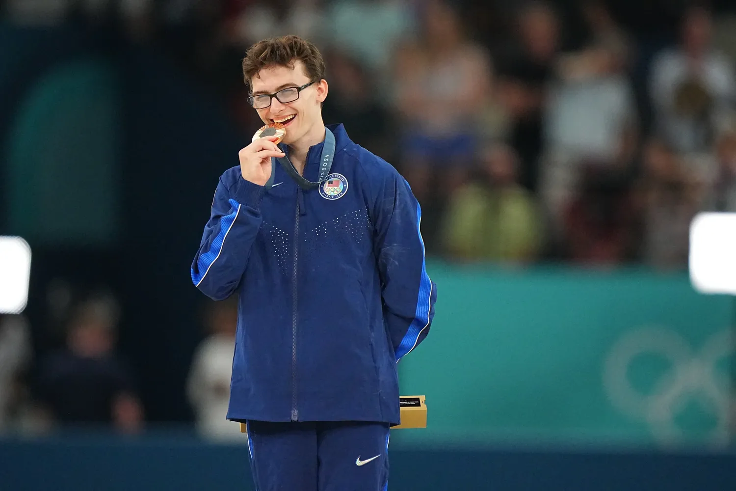 Stephen Nedoroscik smiles with his bronze medal following the men's pommel horse final at Bercy Arena.