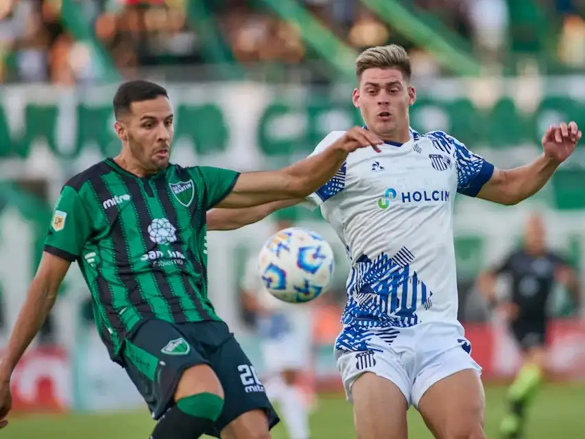 Girotti lucha con Burgos.