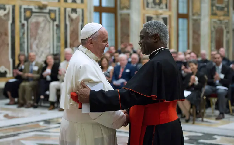 El Papa Francisco y Peter Turkson