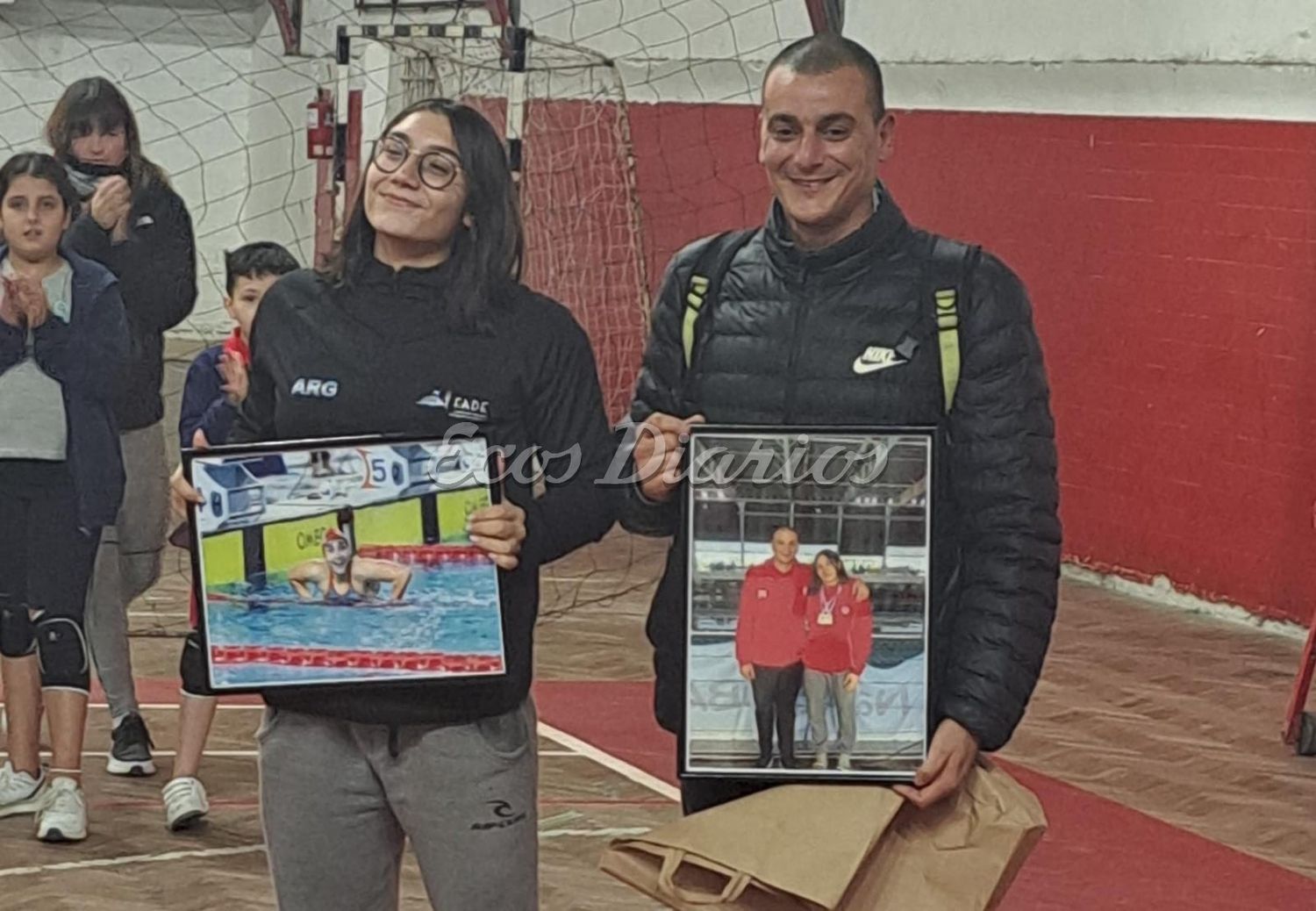 Guadalupe Angiolini junto a su entrenador Claudio Castagnari