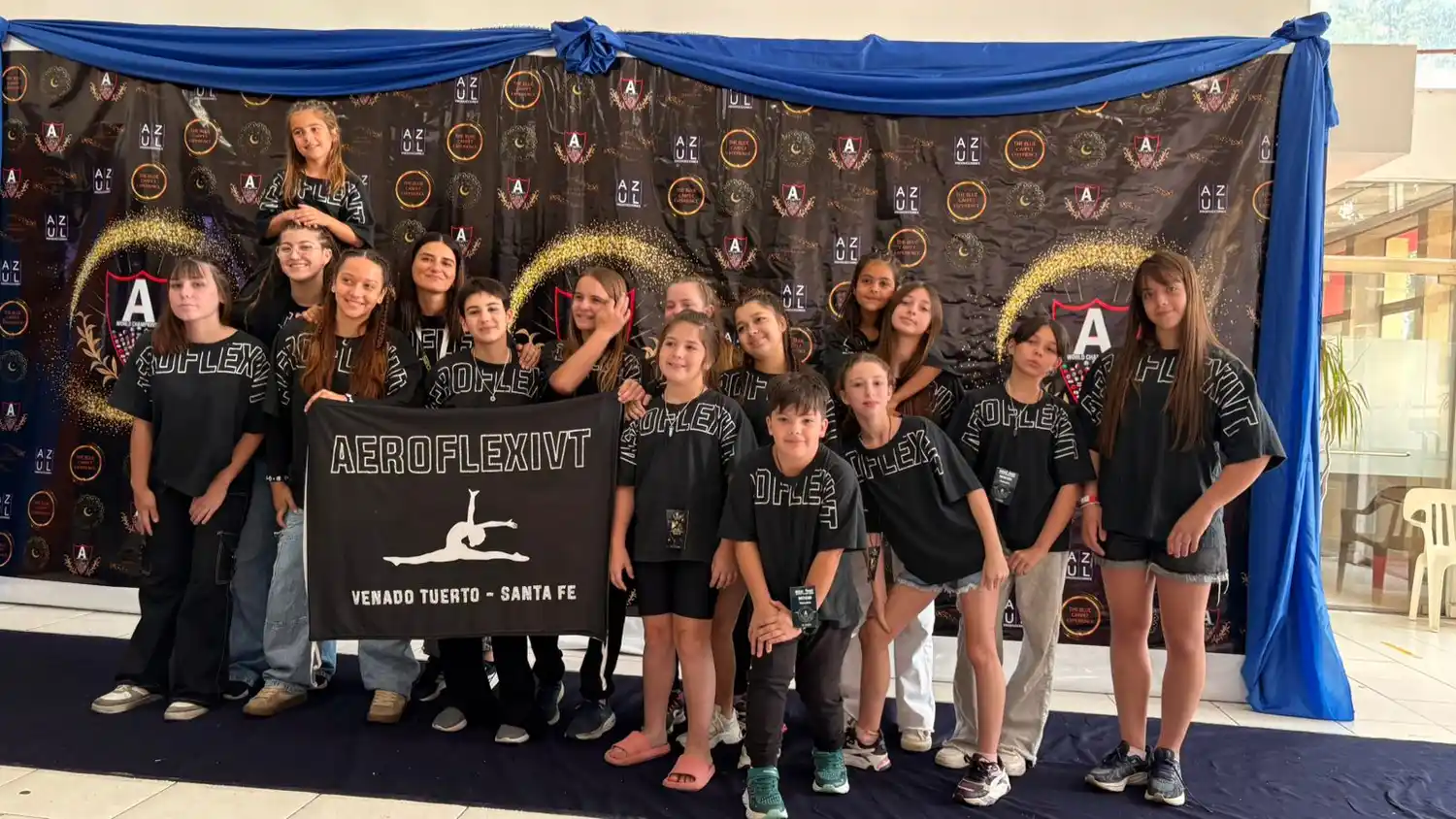Los chicos de AeroFlex que dejaron la bandera venadense en lo más alto.