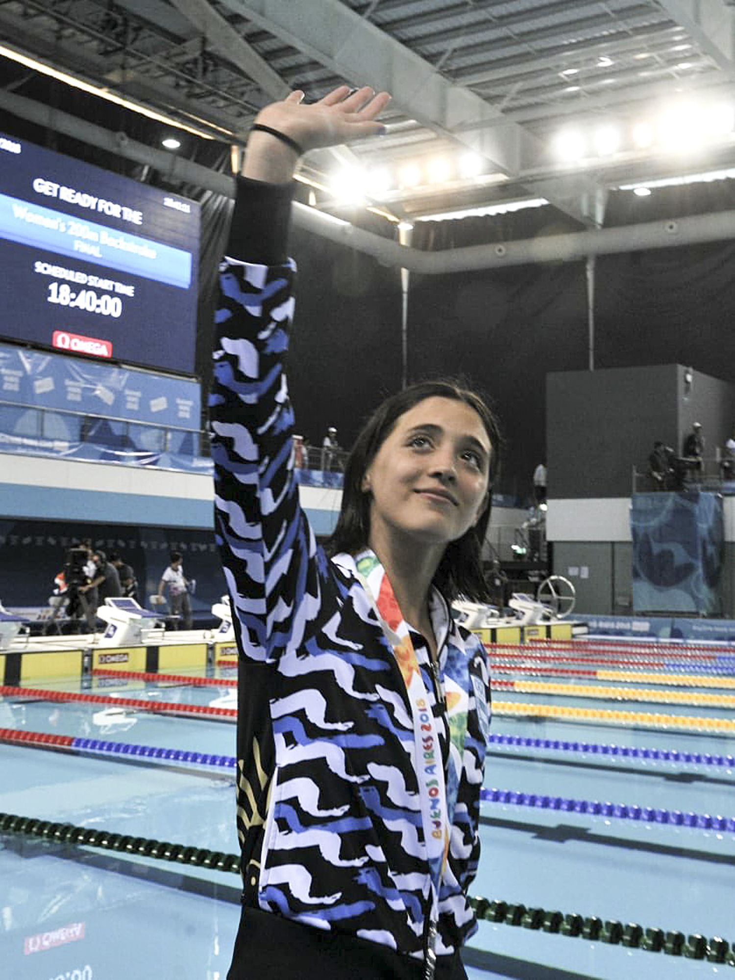 En natación y remo, las primeras medallas