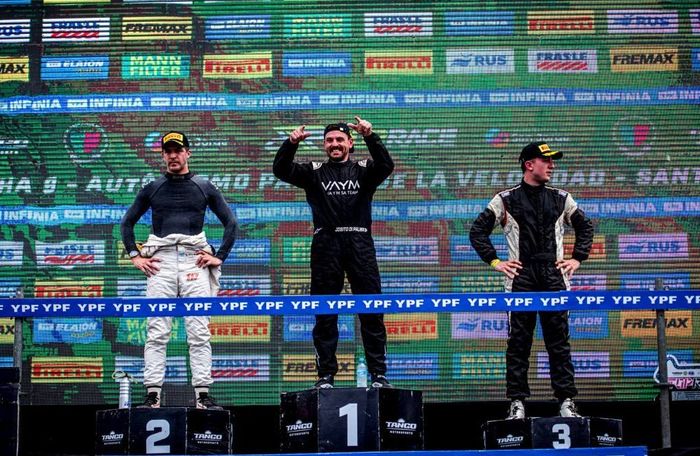 Podio. Rossi (segundo), Di Palma (primero) y Micheloud (tercero)