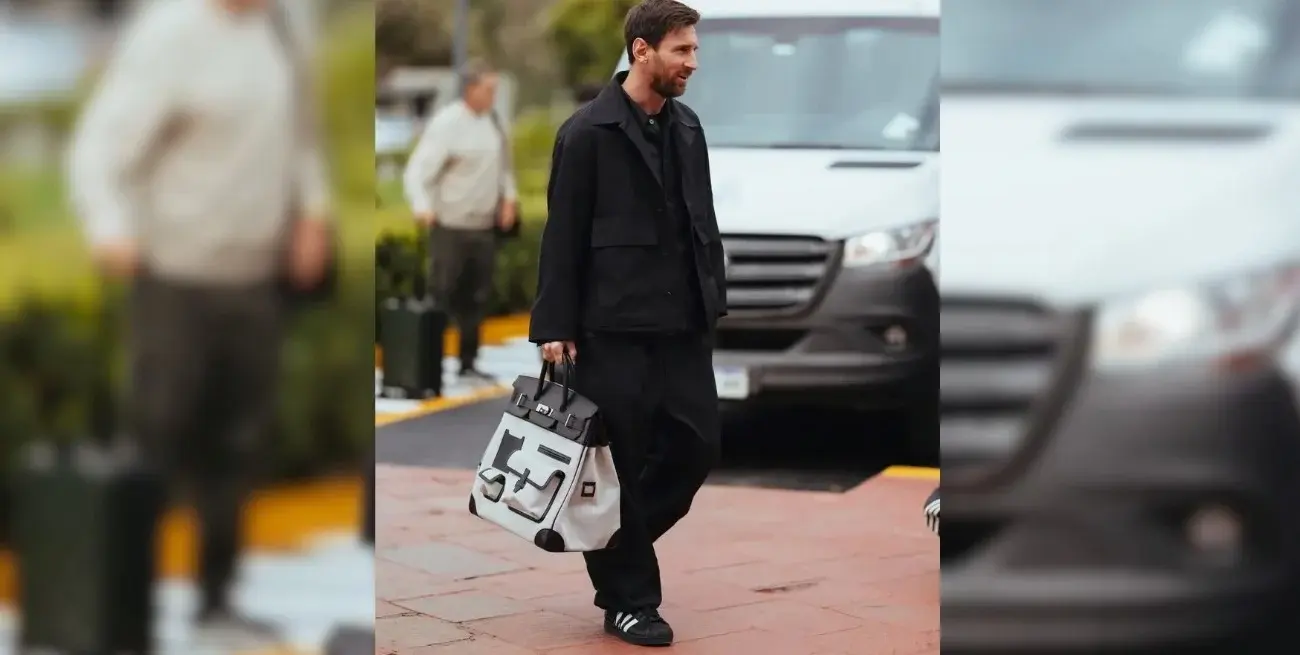 Messi apareció en Ezeiza con estilo total black, un bolso exclusivo y deslumbró a todos