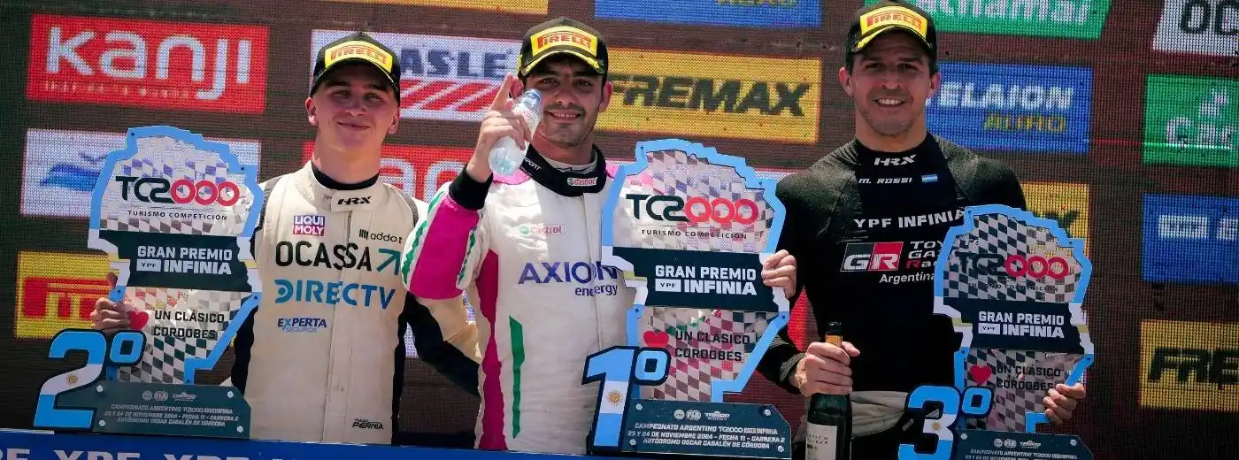 El podio. Pernía (segundo), Aldrighetti (primero) y Rossi (tercero)