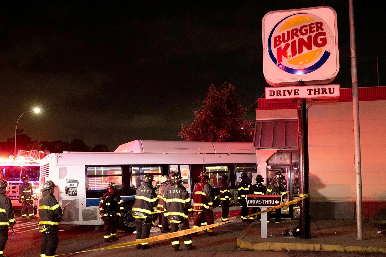 Firefighters at the scene where a bus crashed into a Burger King restaurant at Caton Avenue and Dahill Road in Brooklyn.