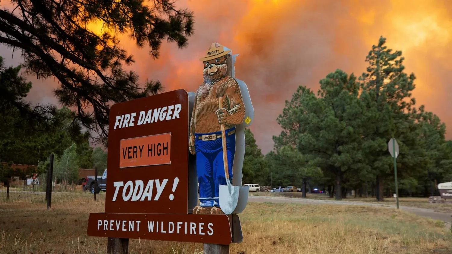 Smoke plumes from the South Fork Fire rise above the tree line as the fire progresses from the Mescalero Apache Indian Reservation to the Lincoln National Forest causing mandatory evacuations in Ruidoso, N. M., June 17, 2024. (