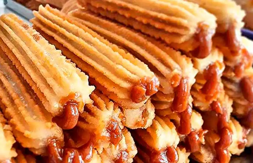 La historia de tres ex empleados de Falabella que venden churros en la peatonal de Rosario