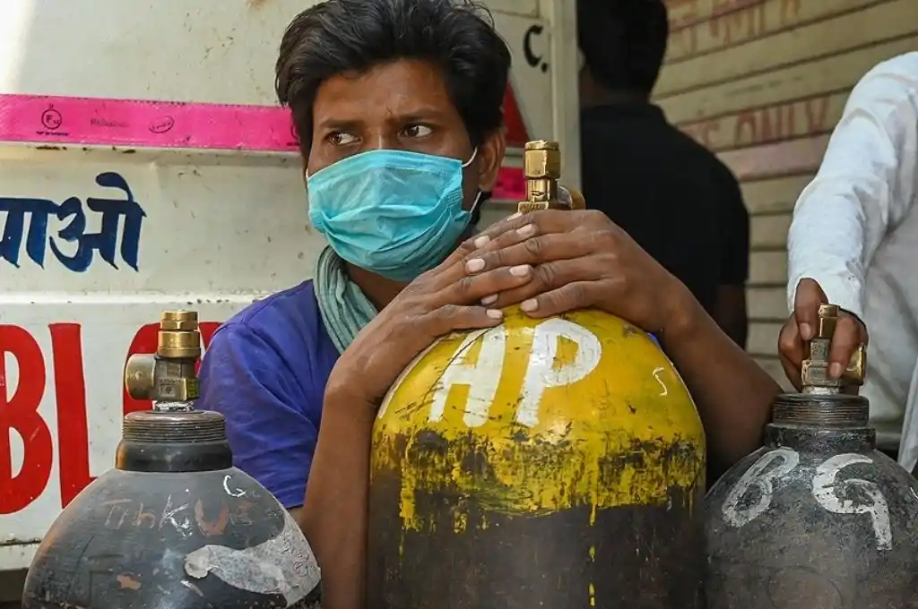 India notificó cerca de 70.500 casos en un día, la cifra más baja desde abril