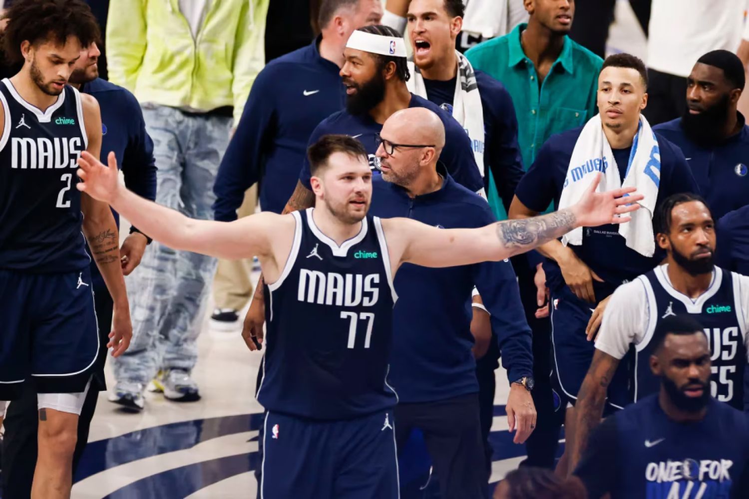 Captured in the euphoria of victory, Luka Doncic celebrates.