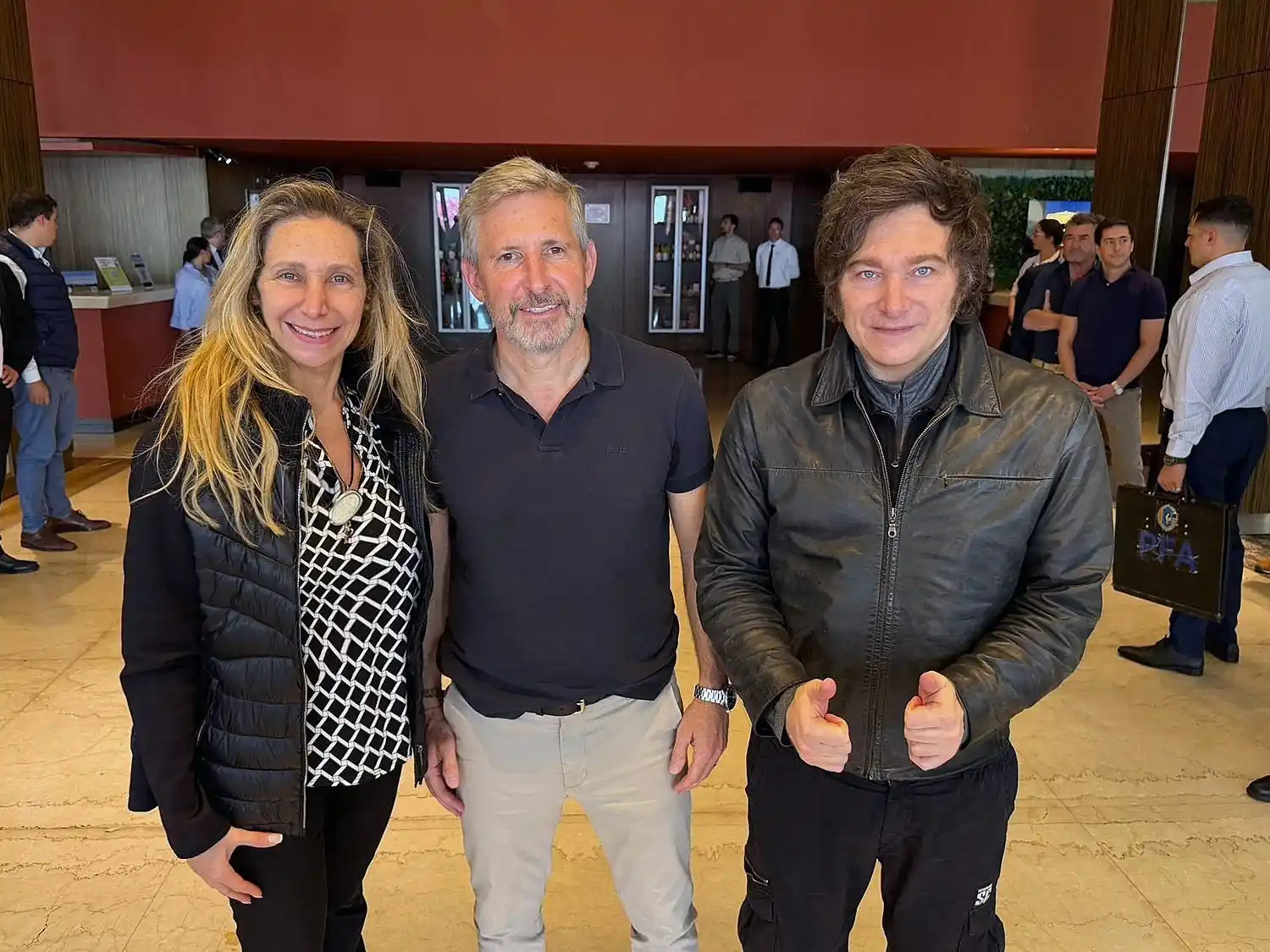 Karina Milei, Rogelio Frigerio y Javier Milei.