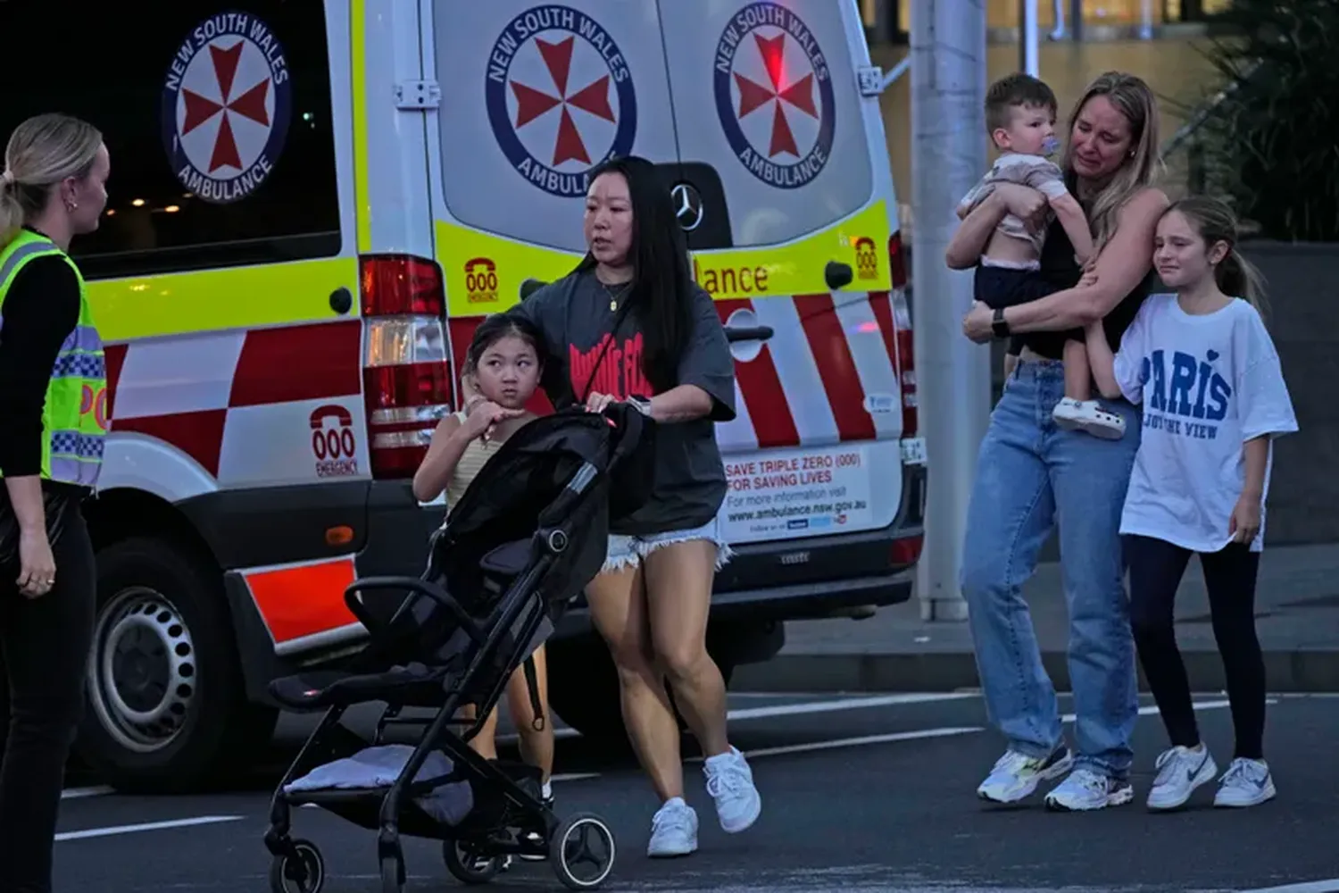 Emergency services are seen outside the scene of a stabbing in Sydney, on Saturday, April 13.