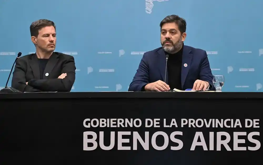 Augusto Costa junto a Carlos Bianco.