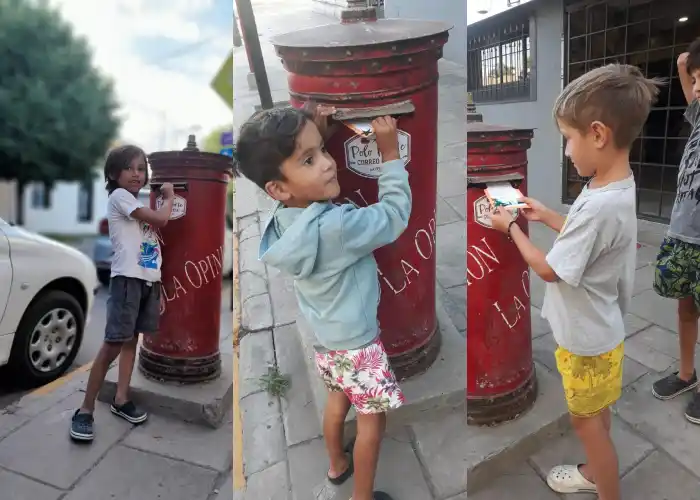 Simón, Felipe y Romeo con su carta navideña