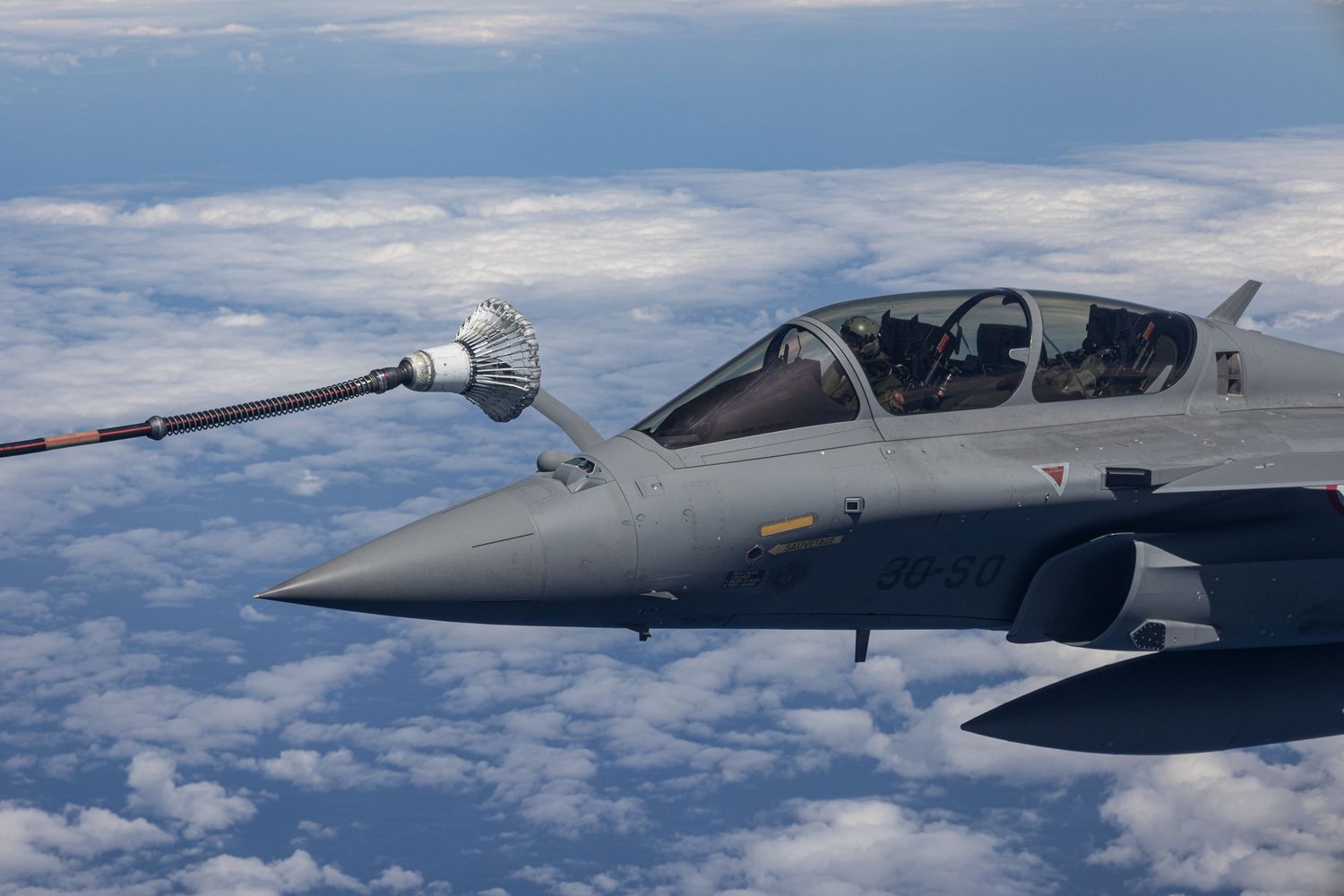 One of the three Rafale fighter jets deployed to French Guiana, refueling over a point in the Atlantic. Photo: French Air and Space Force.