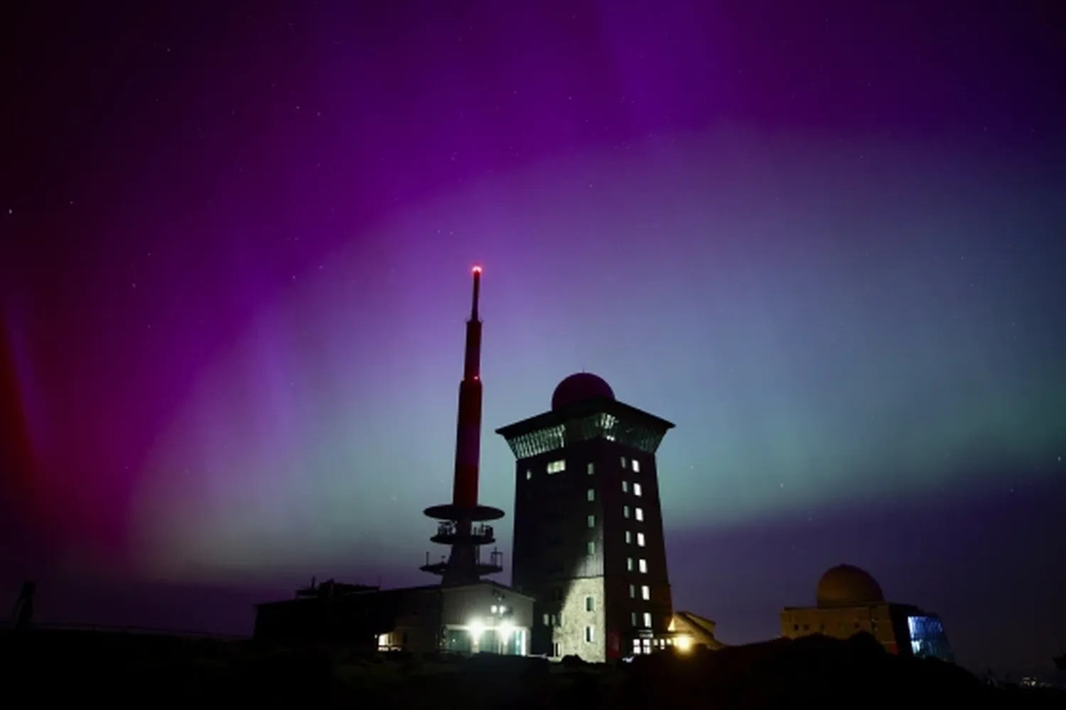 Northern lights appear in the night sky above the Brocken in Schierke, northern Germany on Saturday.