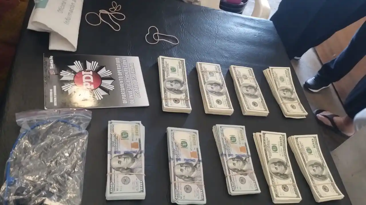 SANTA FE: PDI SECUESTRÓ UNA SUMA MILLONARIA DE DÓLARES POR UN HECHO DE ROBO - 2