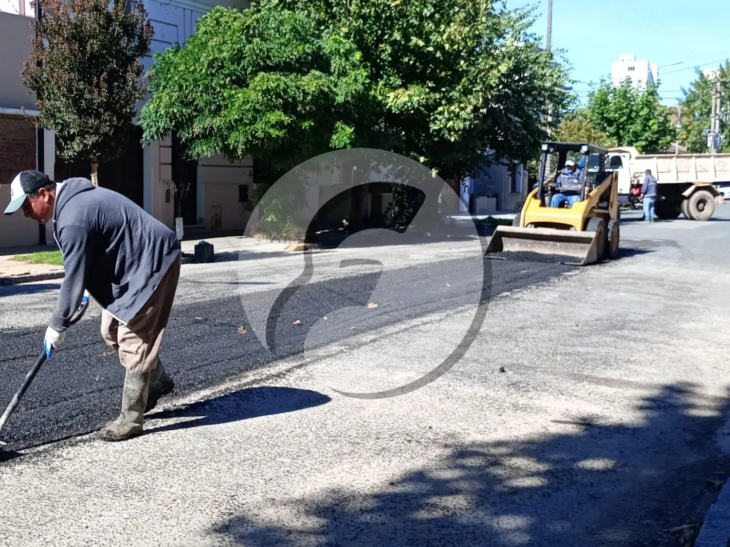Trabajos de bacheo en calle 62
