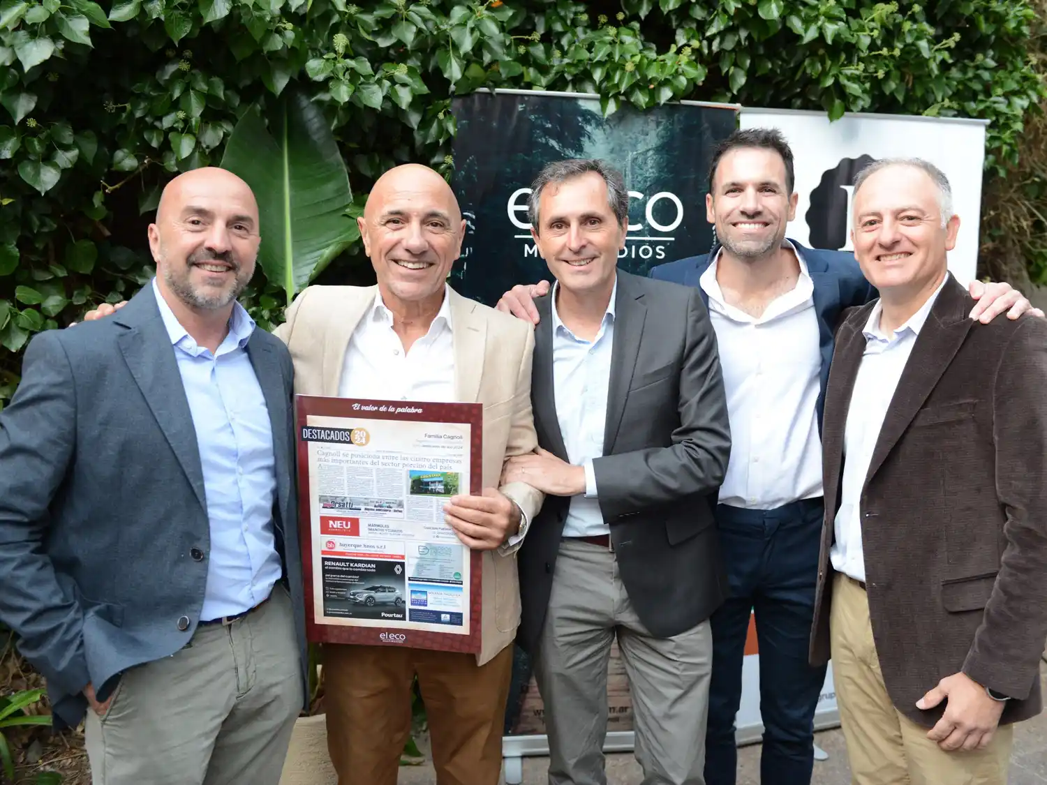 Fabio Cagnoli, Rogelio Rotonda, Pablo Cagnoli, Rodrigo Rotonda y Hernán Cagnoli, en la entrega de la distinción.