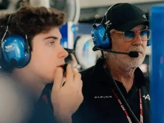 Franco junto a Flavio Briatore.