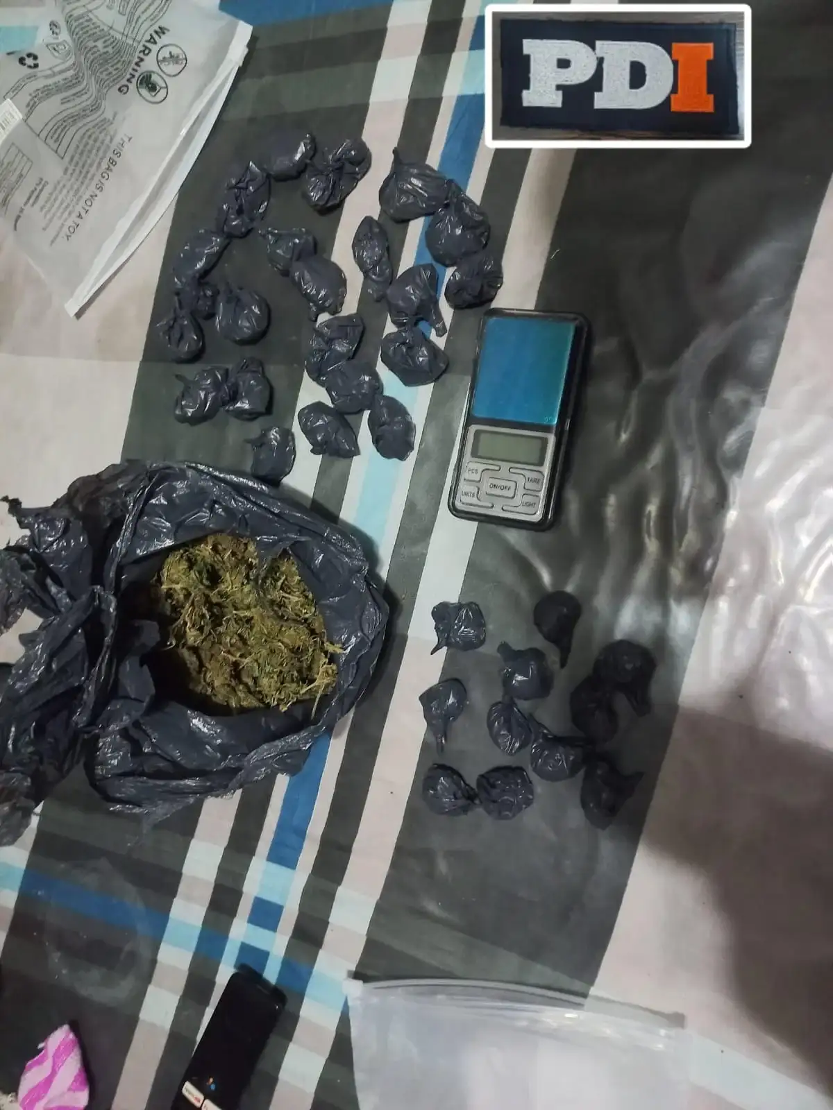 La PDI realizó 17 allanamientos en Rafaela por asociación ilícita y microtráfico. Hubo seis detenidos y secuestraron armas, cocaína, municiones y celulares. - 5