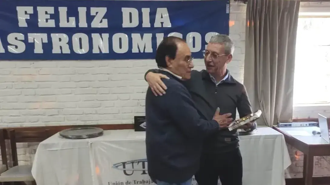 Jorge Gamos y Humberto Salaberry, quien recibió una distinción por su trayectoria