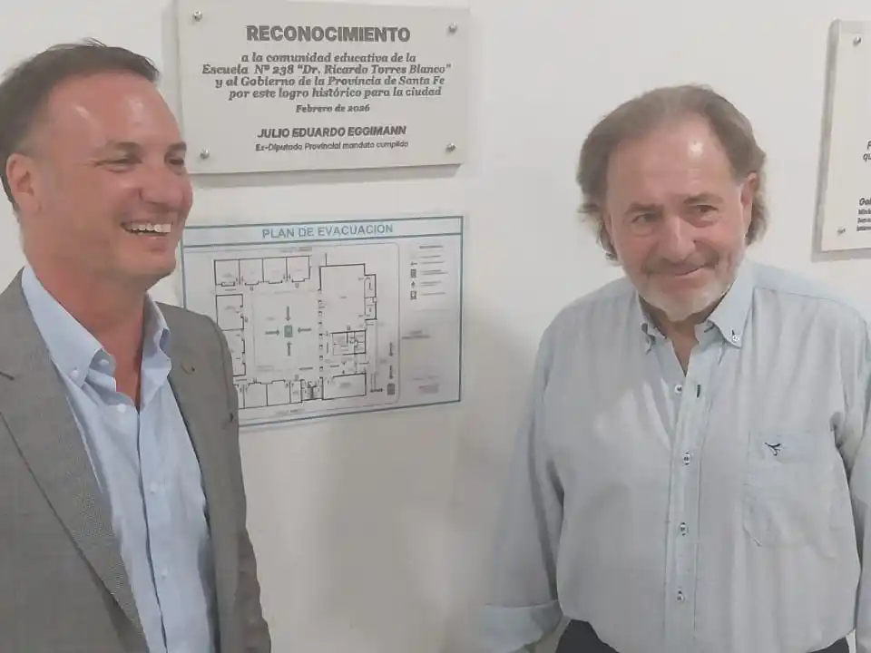 Lisandro Enrico y Julio Eggimann, sonrientes al término de la emotiva ceremonia inaugural. Foto: Sur24