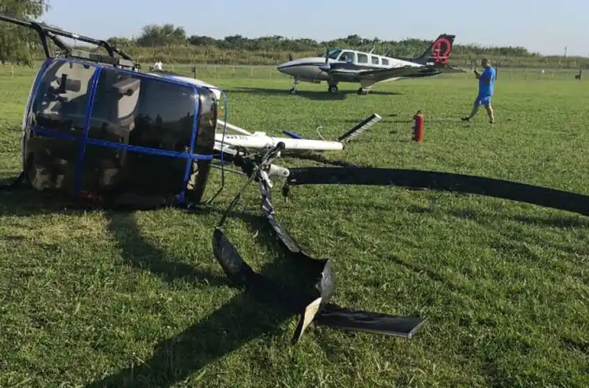 Un helicóptero cayó antes de aterrizar y dos personas se salvaron de milagro