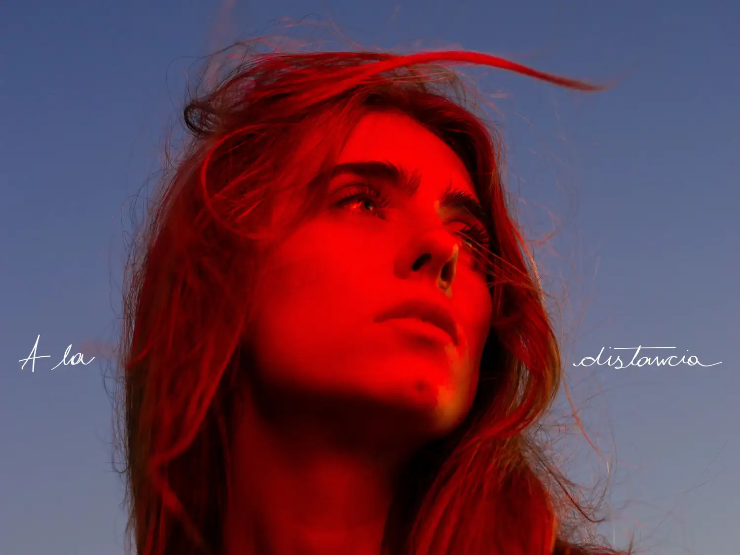 Portada de "A la distancia" lo nuevo de Judith