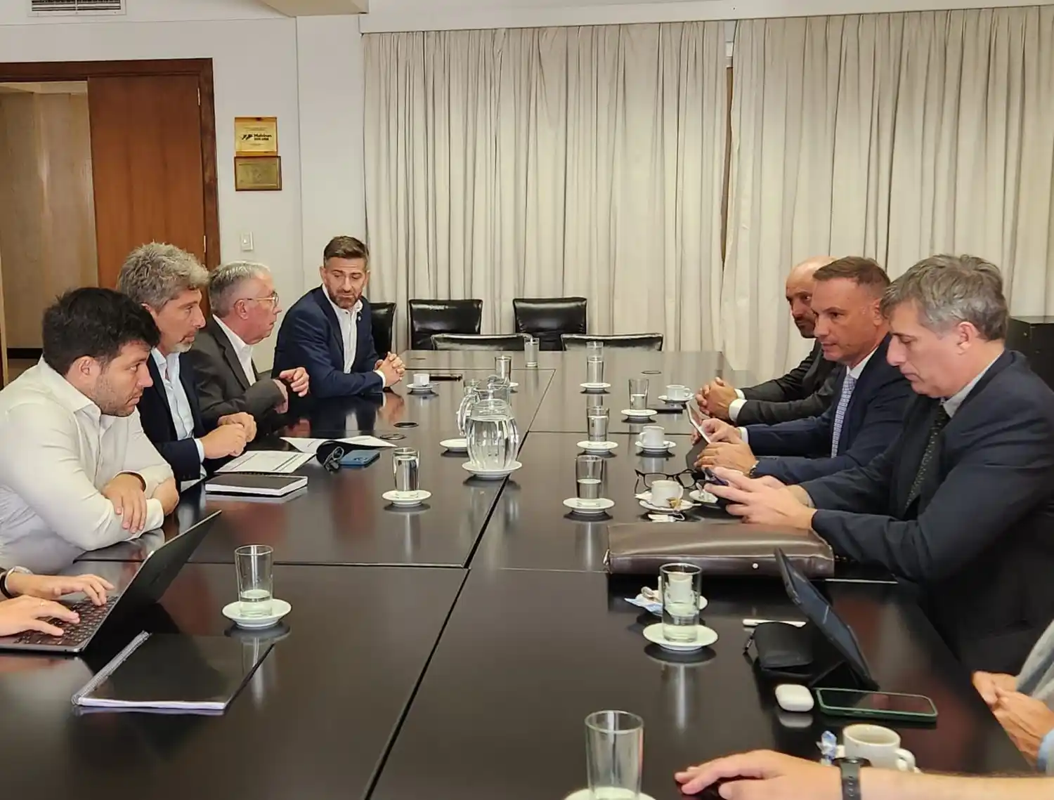 Enrico, Puccini y Olivares en el Ministerio de Economía de la Nación.
