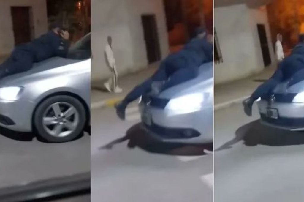 Arrastró a un policía en el capó