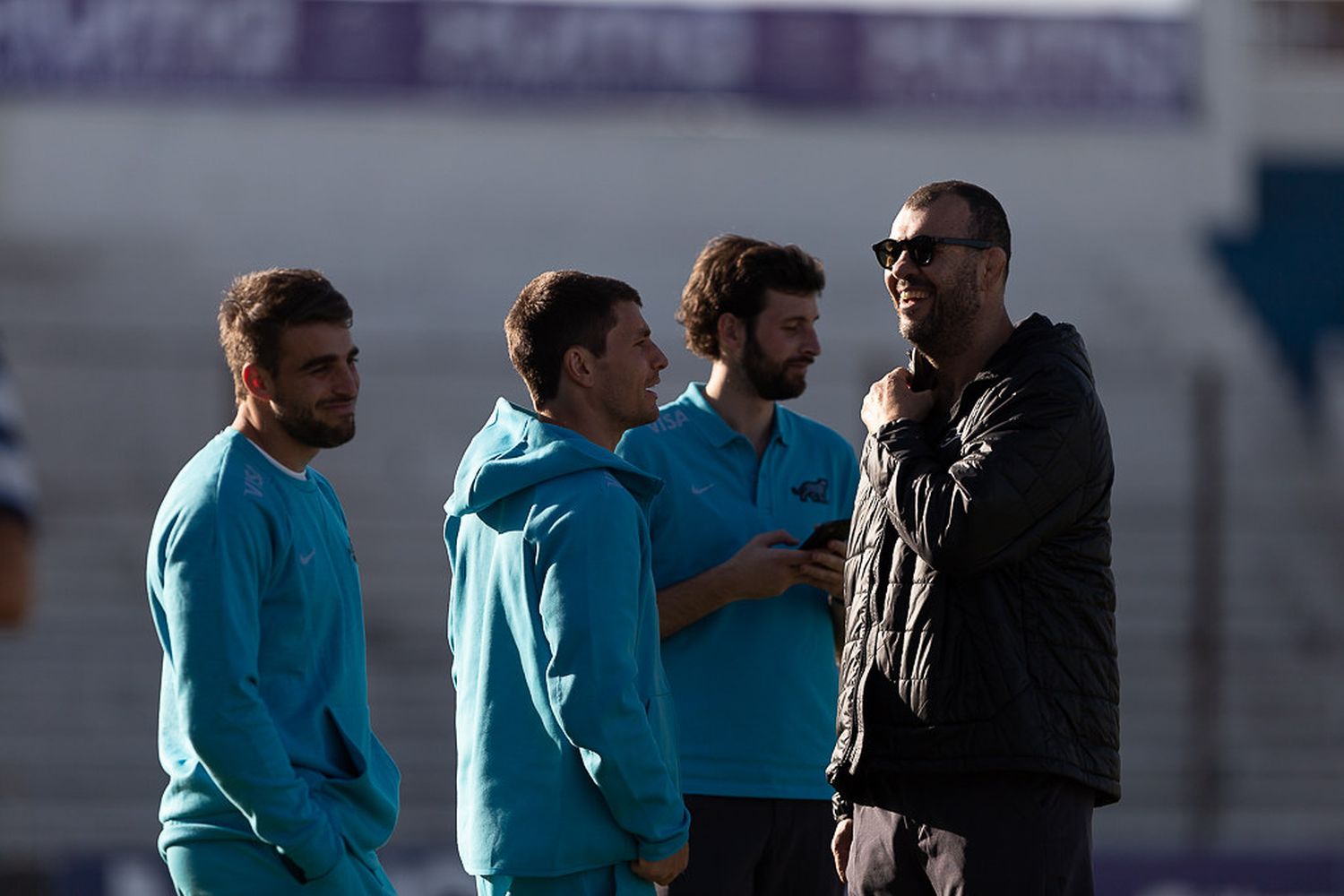 Cheika, deburante como entrenador, junto a Bertranou y Mallía.