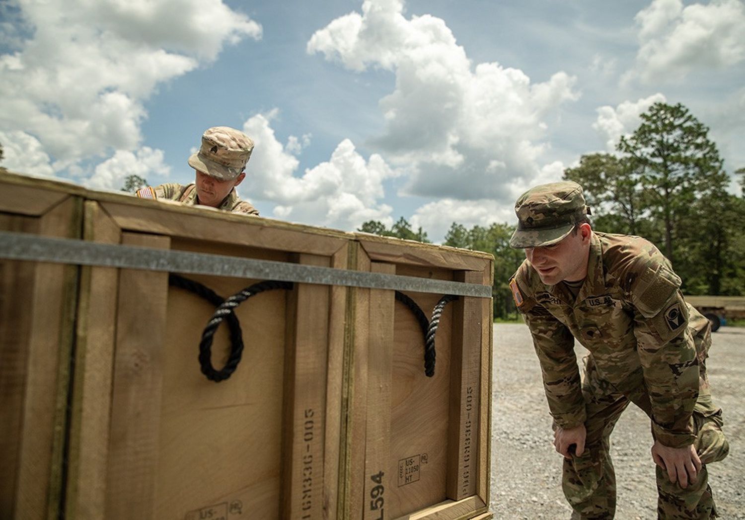 Florida Army Guard soldiers load ammunition during the xCTC exercise at Camp Shelby.