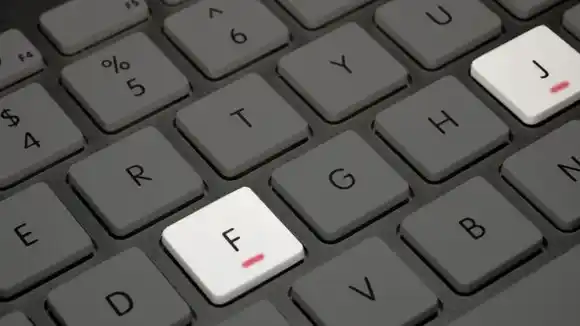 ¿Por qué los teclados tienen las letras F y J con una línea horizontal?