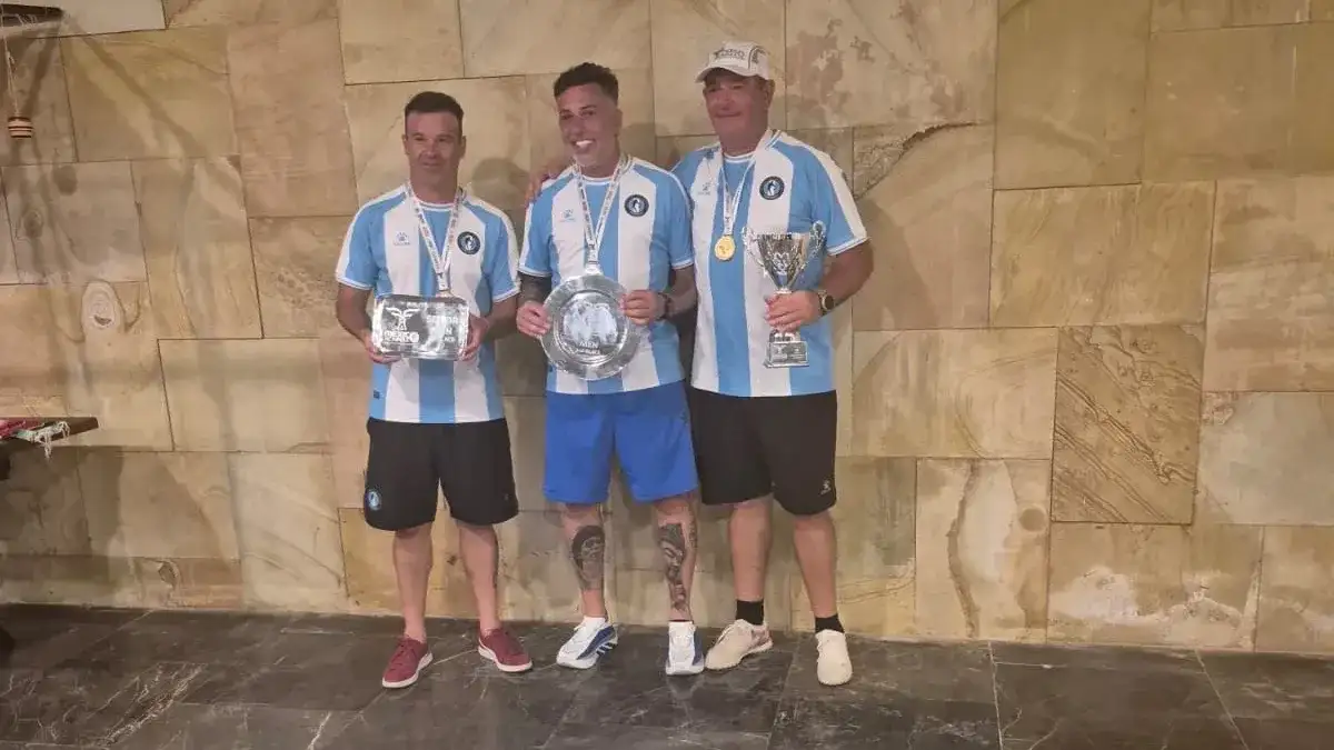 Marcos Ghezzi, Novosad (subcampeón en la General) y Toth.