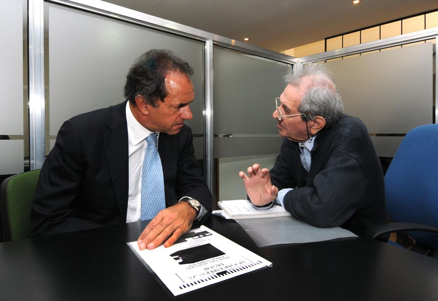 Daniel Scioli junto al Padre Troncoso.