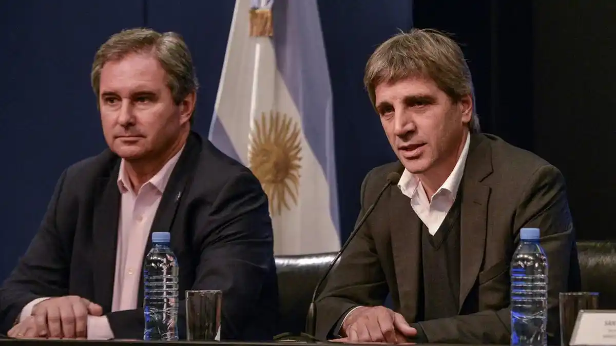 Pablo Quirno junto con Luis Caputo