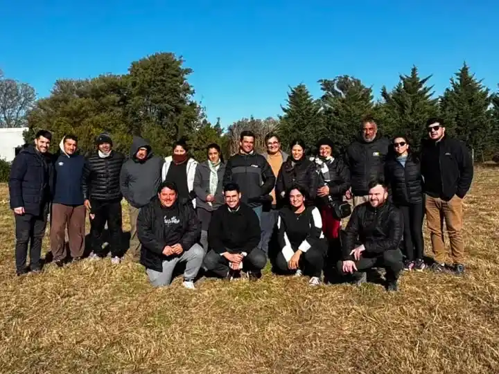 Las familias beneficiarias de los terrenos.