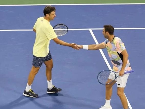 "Cebolla" Zeballos a semis del US OPen junto a su compañero Marcel Granollers.