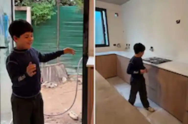 La emoción de su hijo al ver su nueva cocina.