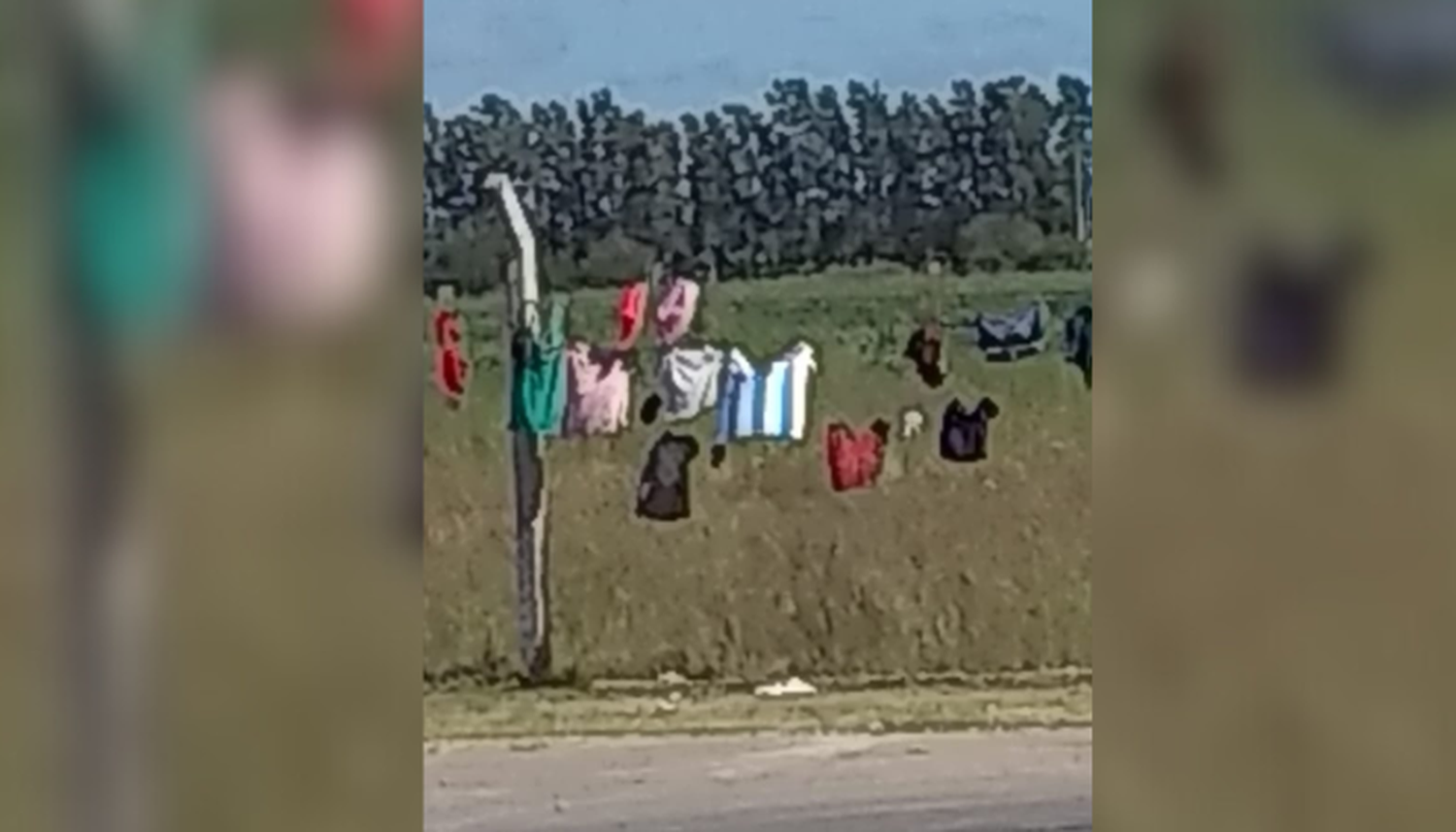 Una postal para el turismo: la ropa tendida en el alambrado de la Nueva Terminal de San Pedro.