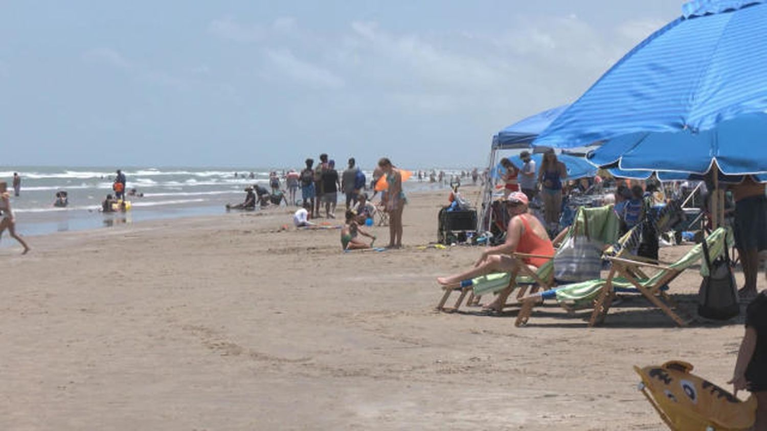 A shark bit three people off a southern Texas beach